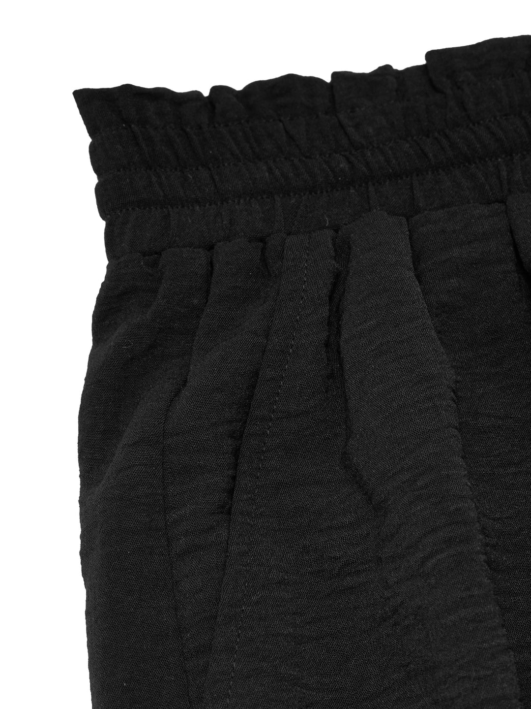 Pantalones casuales atados a los pantalones de mujeres largos
