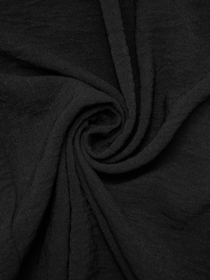 Pantalones casuales atados a los pantalones de mujeres largos